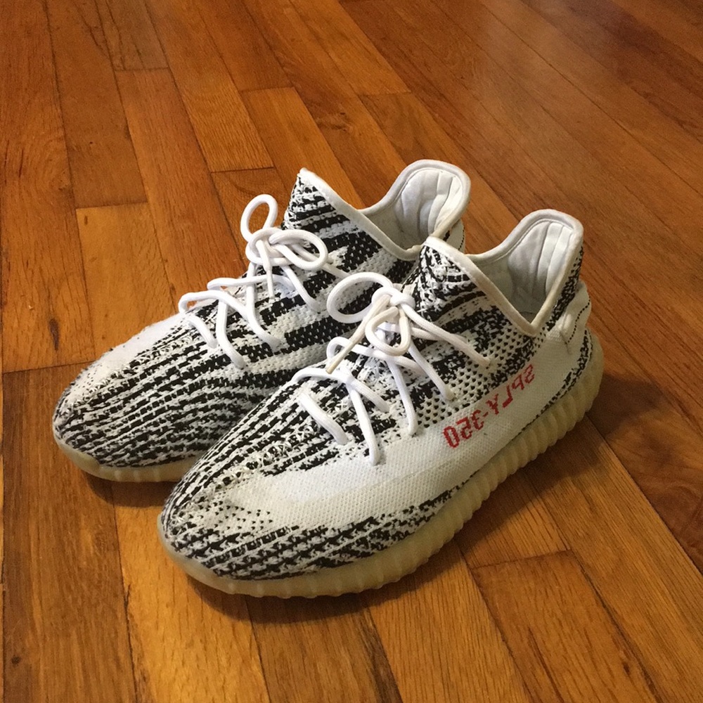 Zebra print 350 v2 Yeezy Boost athletic shoes.